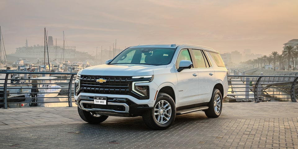 Front Three-Quarters View of the 2025 Chevrolet Tahoe SUV Parked on Gravel