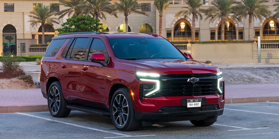 Front Three-Quarters View of the 2025 Chevrolet Tahoe SUV Parked on the Concrete Road