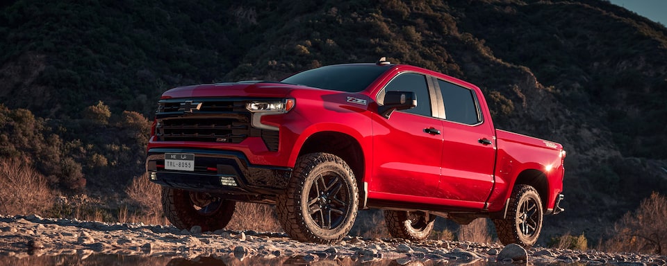 2025 Chevy Silverado Towing on Mountainside Road