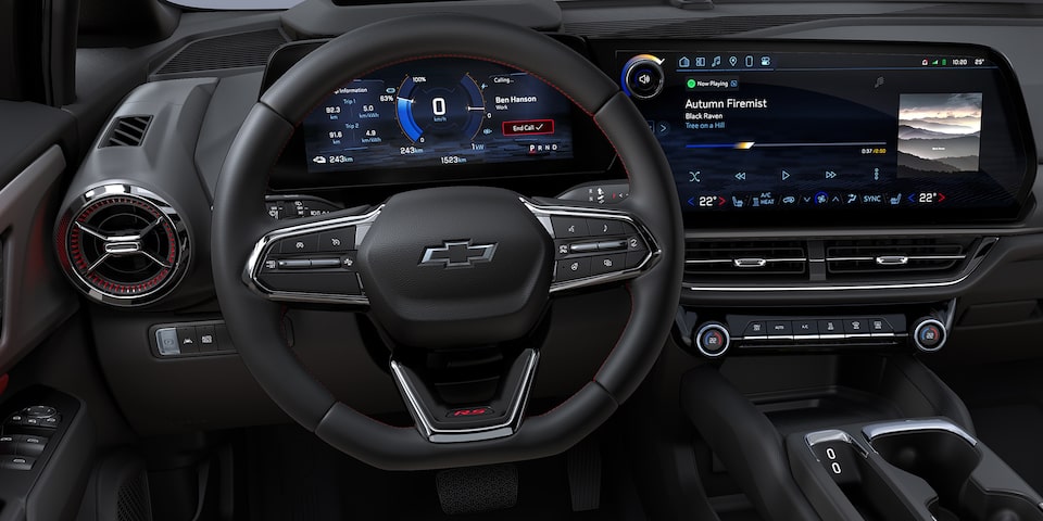 Driver’s Seat View of the Steering Wheel and Display Monitor of 2025 Chevy Equinox EV