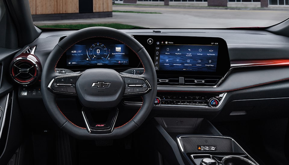 Driver’s Seat View of the Steering Wheel and Display Monitor of 2025 Chevy Equinox EV